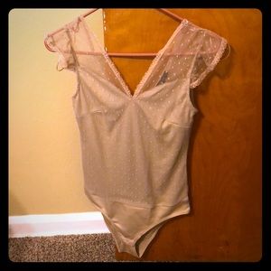 Tan fashion nova bodysuit with see through back!